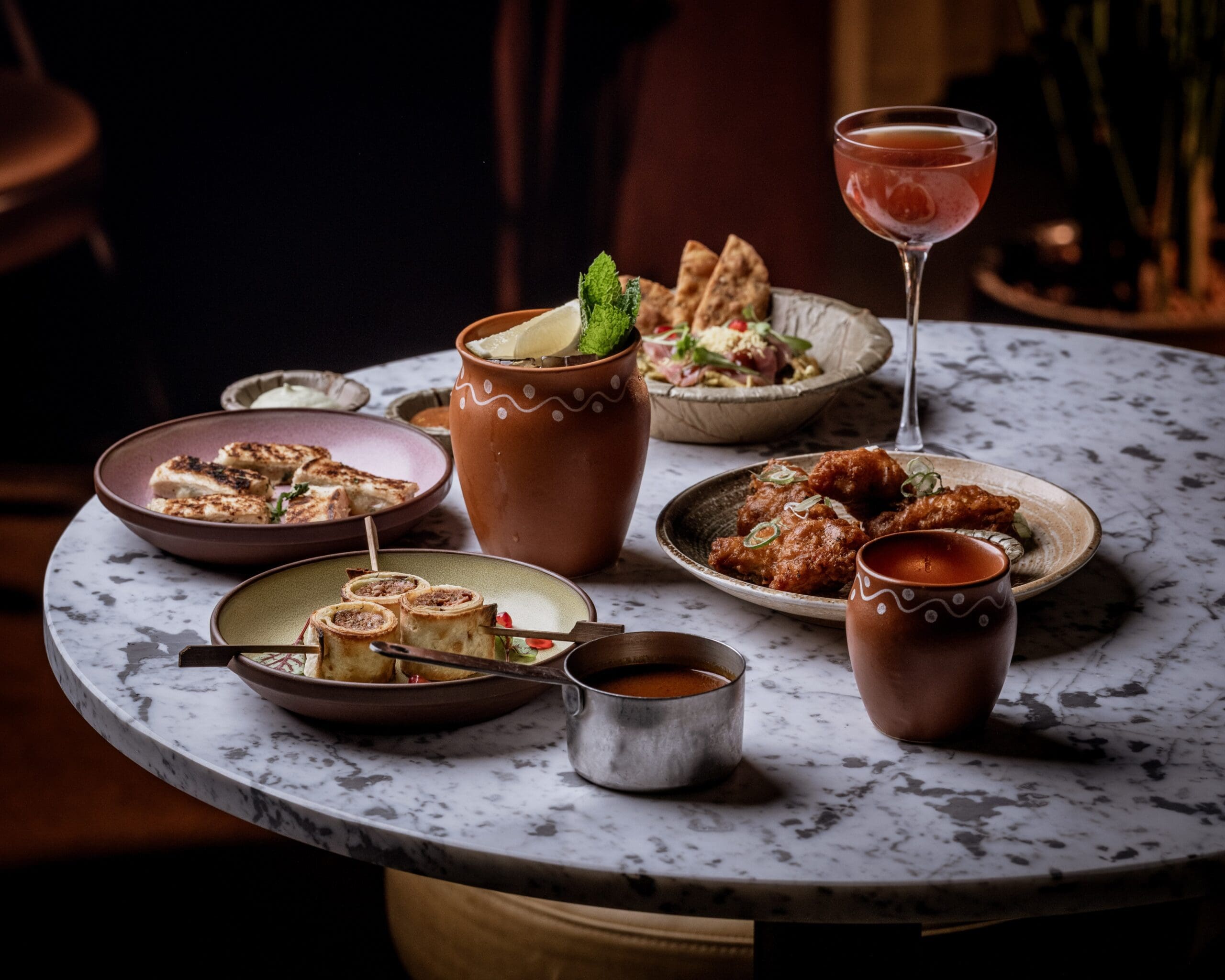 assorted indian snack and cocktail